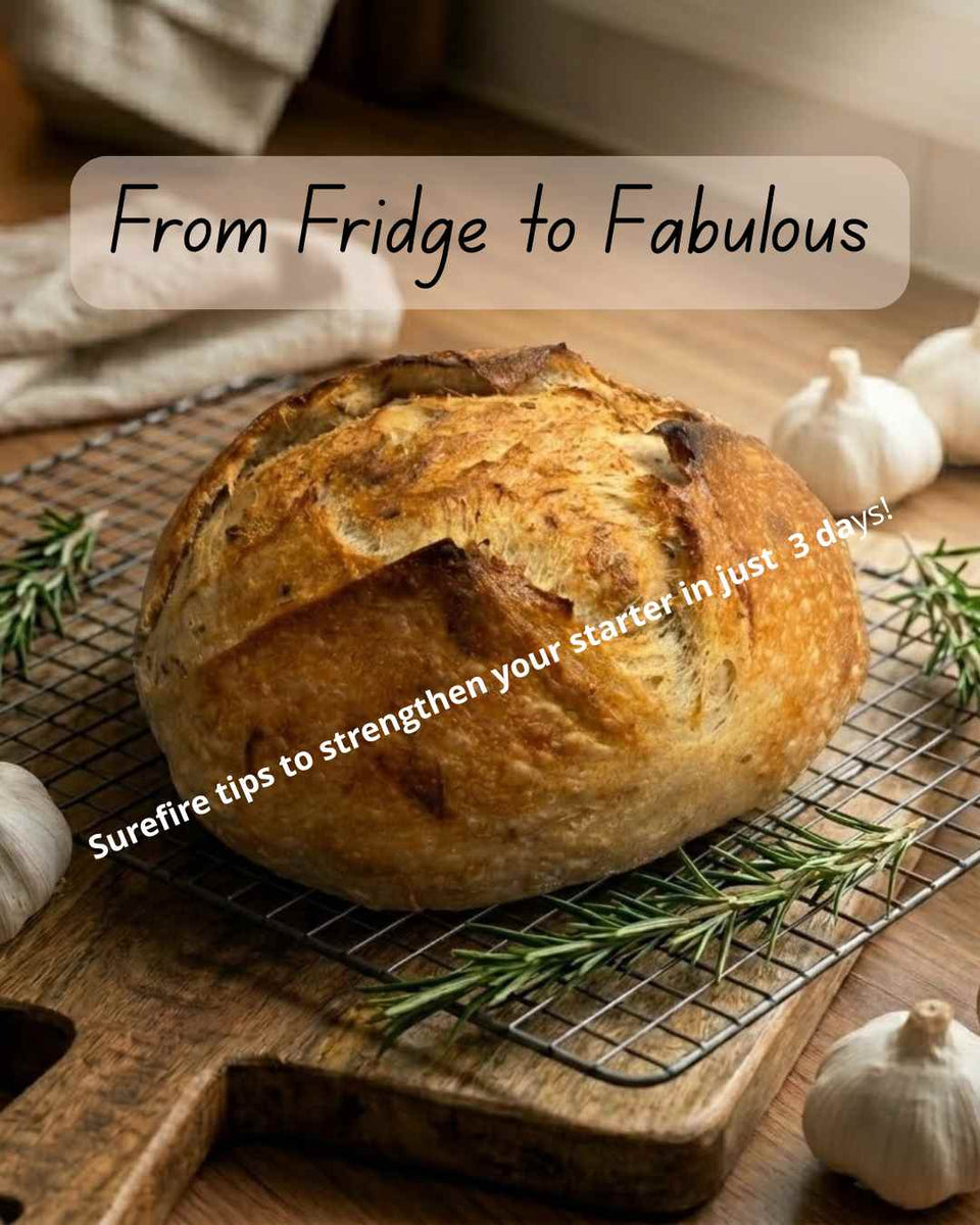 Loaf of bread on a cooling rack with text overlay on a wooden surface cover of PDF with tips to strengthen your sourdough starter